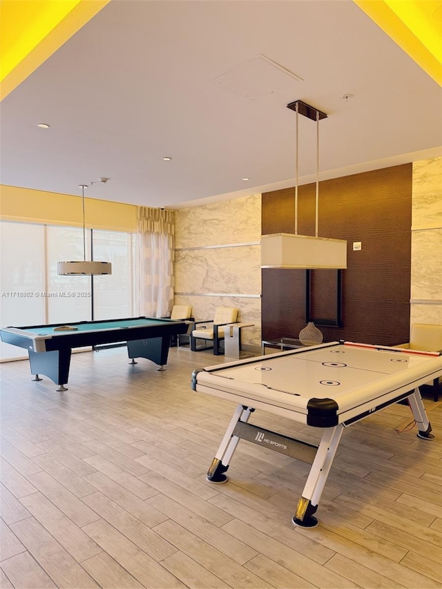 game room featuring hardwood / wood-style floors and pool table