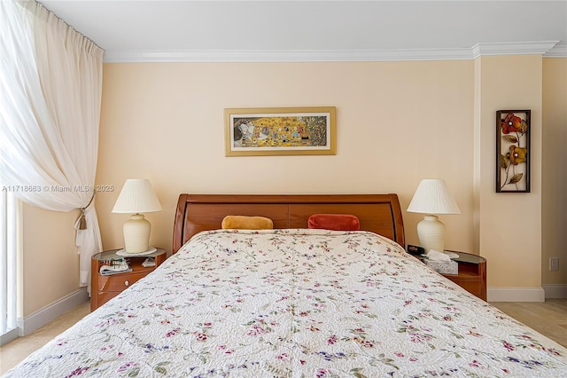 bedroom with crown molding