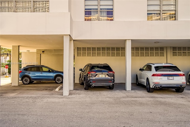 view of parking with a carport