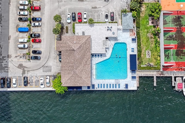 drone / aerial view with a water view