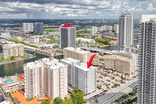 birds eye view of property featuring a water view