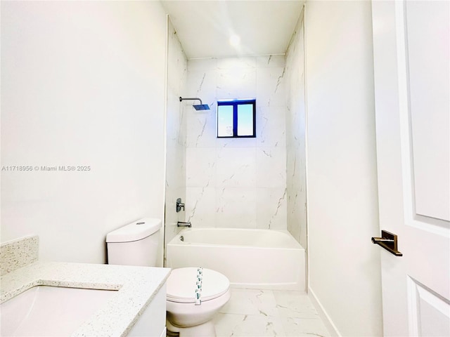 full bathroom with vanity, tiled shower / bath combo, and toilet