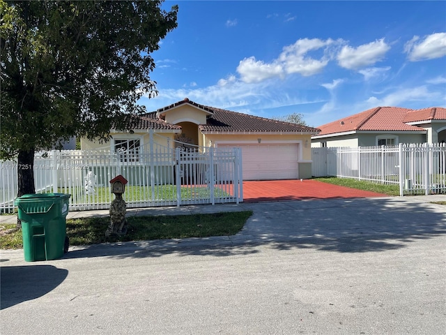 mediterranean / spanish house featuring a garage