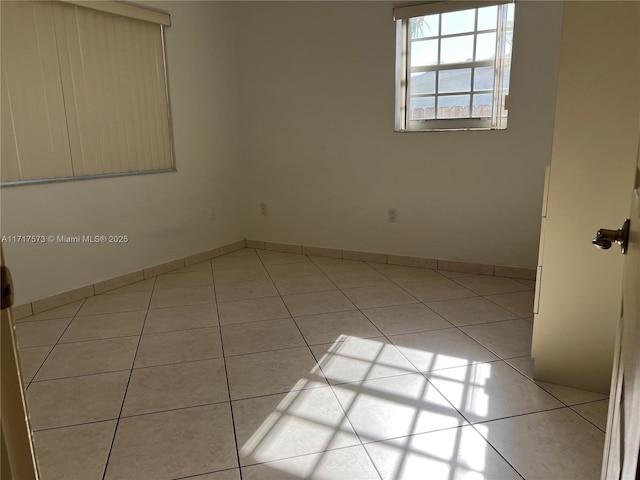 view of tiled spare room