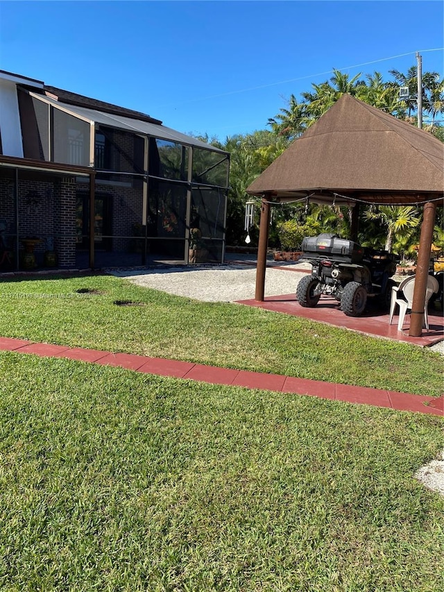 view of yard featuring a lanai