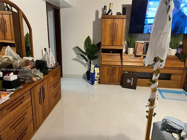 bathroom with tile patterned floors