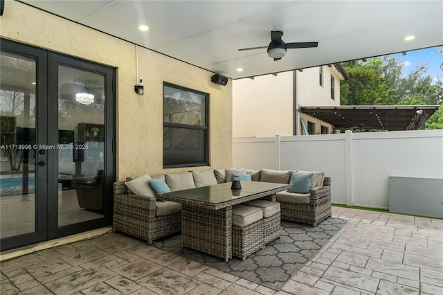 view of patio / terrace featuring ceiling fan and french doors