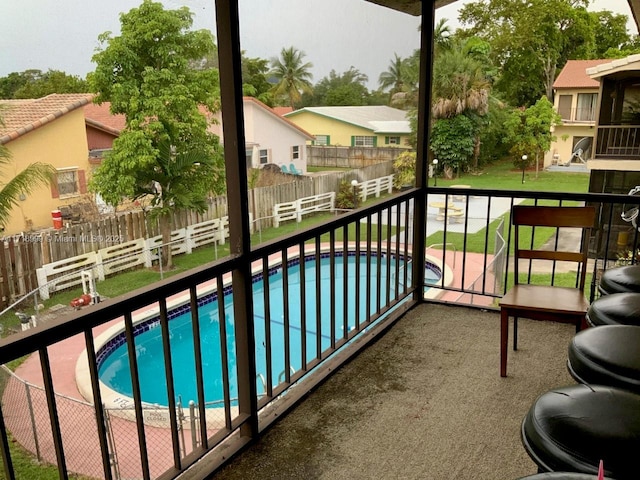 balcony featuring a residential view