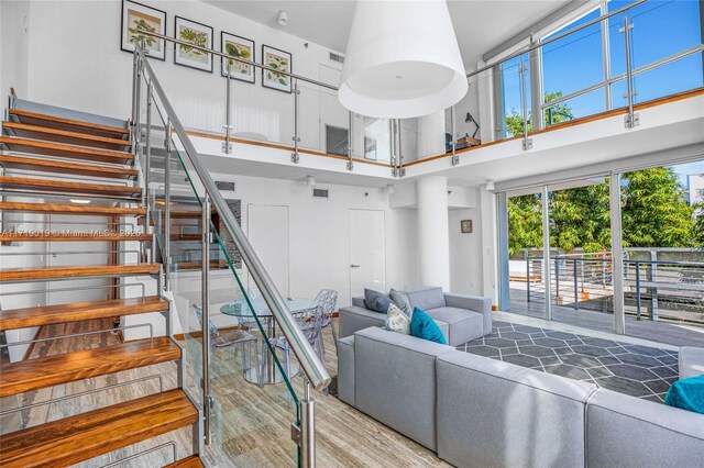 living room with a high ceiling