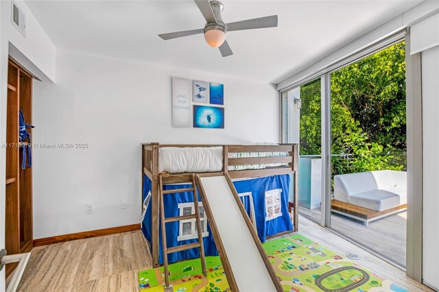 bedroom with light wood-type flooring