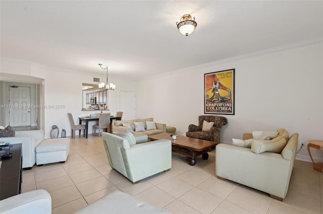 tiled living room with crown molding and a chandelier