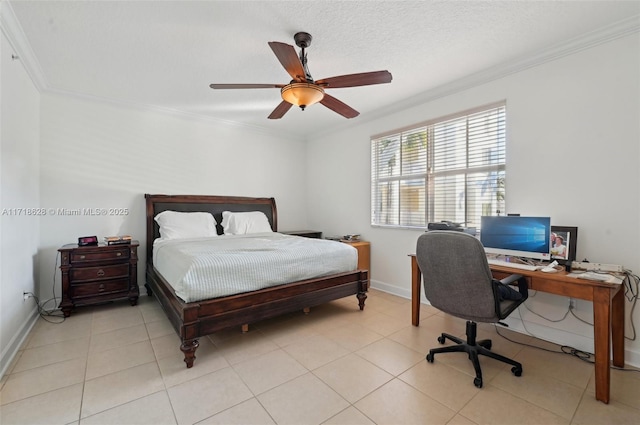 bedroom featuring ceiling fan, a textured ceiling, light tile patterned floors, and crown molding