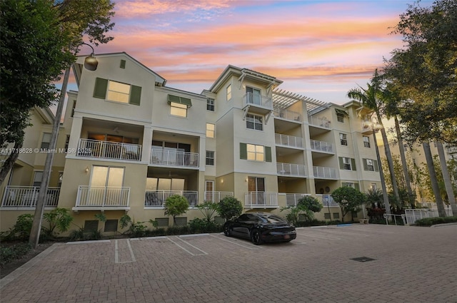 view of outdoor building at dusk