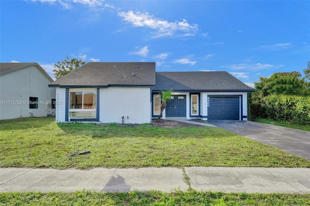 view of front facade featuring a garage and a front yard