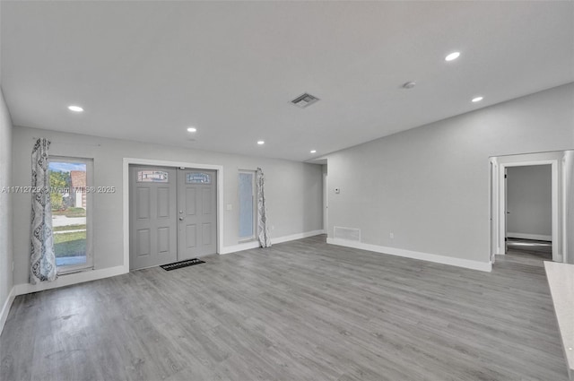 interior space with light hardwood / wood-style floors