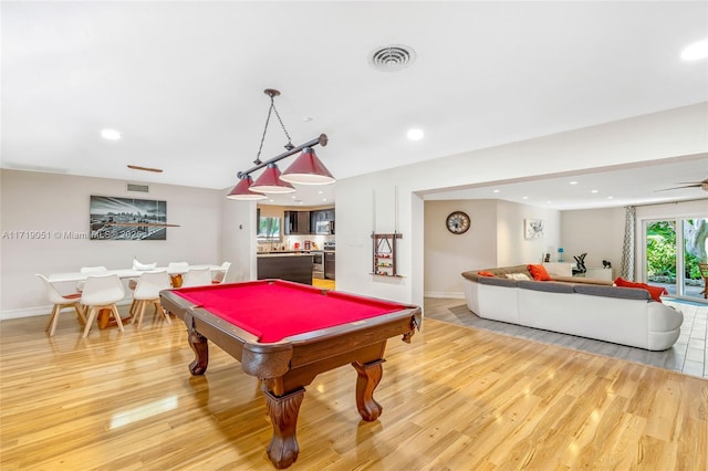 recreation room featuring light wood-type flooring, ceiling fan, and billiards