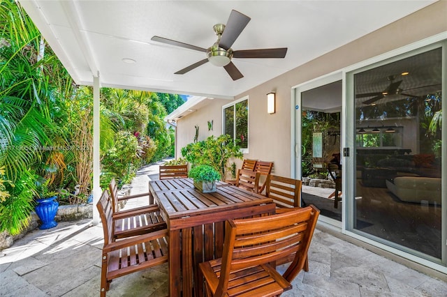 view of patio / terrace featuring ceiling fan