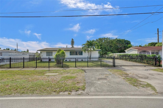 single story home with a front yard