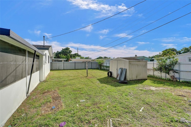 view of yard with a storage shed