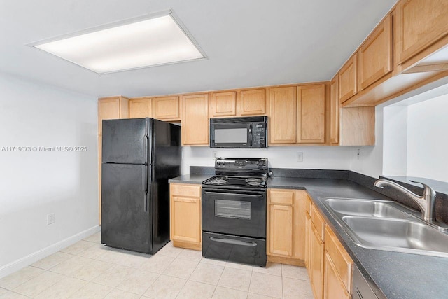 kitchen with light brown cabinetry, sink, light tile patterned floors, and black appliances