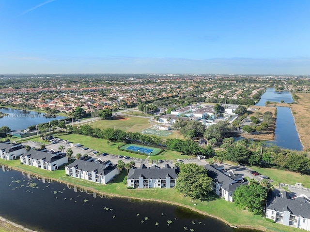 bird's eye view with a water view