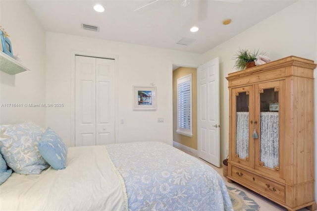 bedroom featuring a closet and ceiling fan