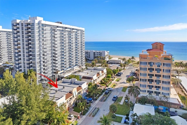 drone / aerial view with a water view