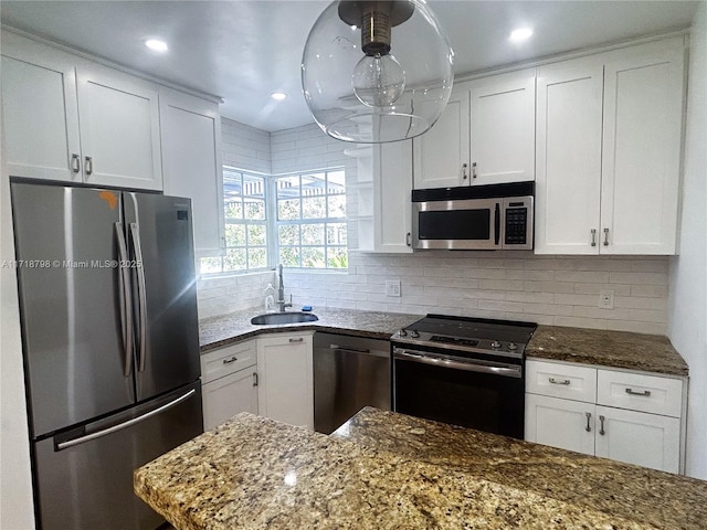 kitchen with white cabinetry, sink, and appliances with stainless steel finishes