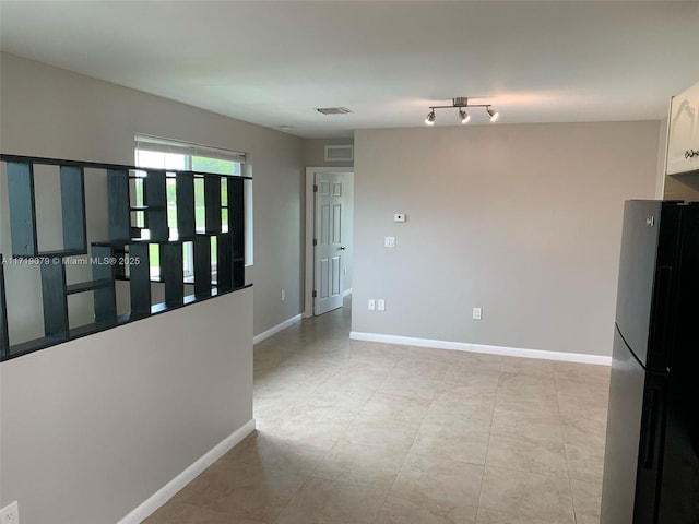 2250 W 5th Way, Hialeah, FL 33010 - spare room featuring baseboards
