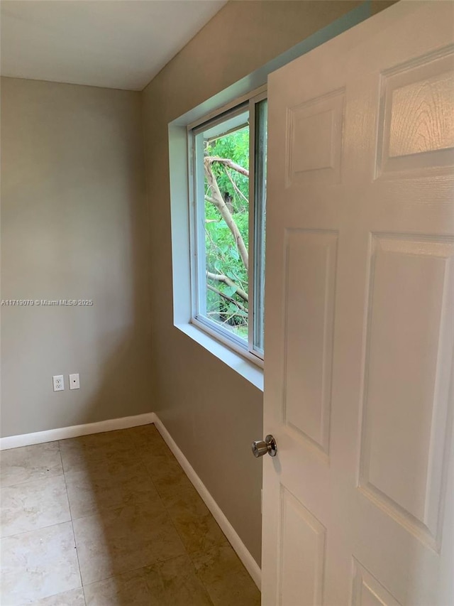 2250 W 5th Way, Hialeah, FL 33010 - unfurnished room featuring baseboards and tile patterned floors