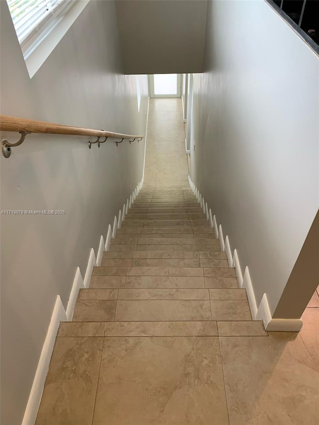 2250 W 5th Way, Hialeah, FL 33010 - staircase with plenty of natural light and a skylight
