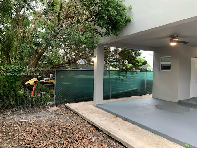 view of patio / terrace featuring ceiling fan