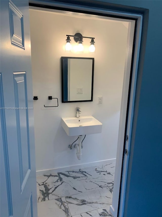 2250 W 5th Way, Hialeah, FL 33010 - bathroom with marble finish flooring and a sink