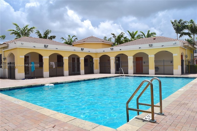 view of pool featuring a patio area