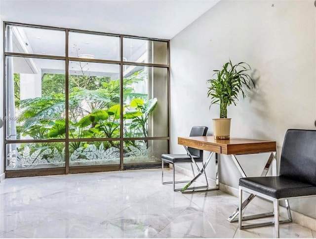 office space featuring expansive windows