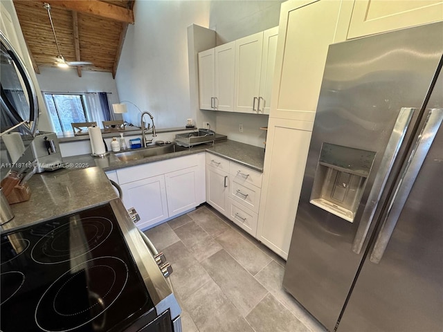 kitchen featuring wooden ceiling, a sink, electric stove, stainless steel fridge with ice dispenser, and beamed ceiling