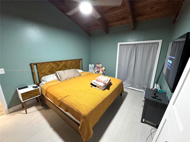 bedroom featuring ceiling fan, wood ceiling, wood-type flooring, and lofted ceiling with beams