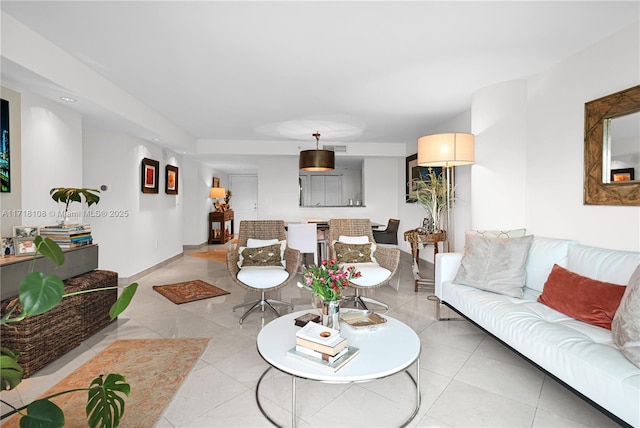 living room featuring light tile patterned flooring