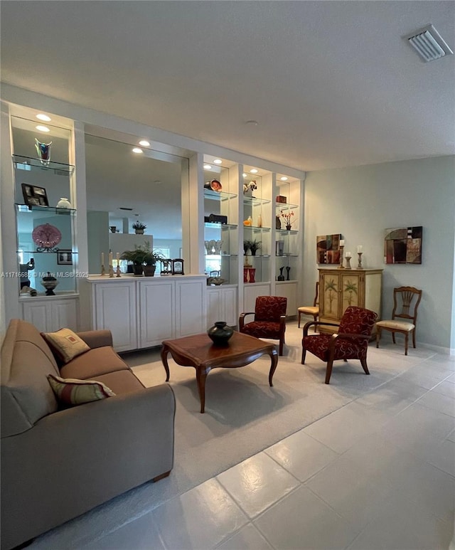 sitting room with light tile patterned flooring