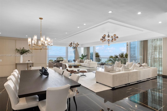 dining space featuring expansive windows, a wealth of natural light, and a notable chandelier