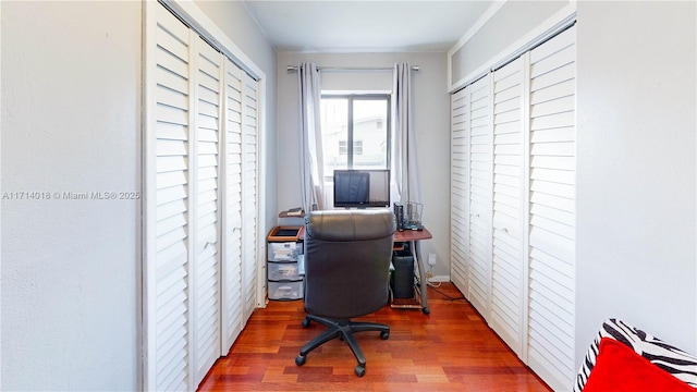 home office featuring dark hardwood / wood-style flooring