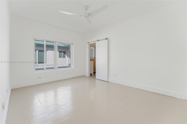 unfurnished room featuring ceiling fan