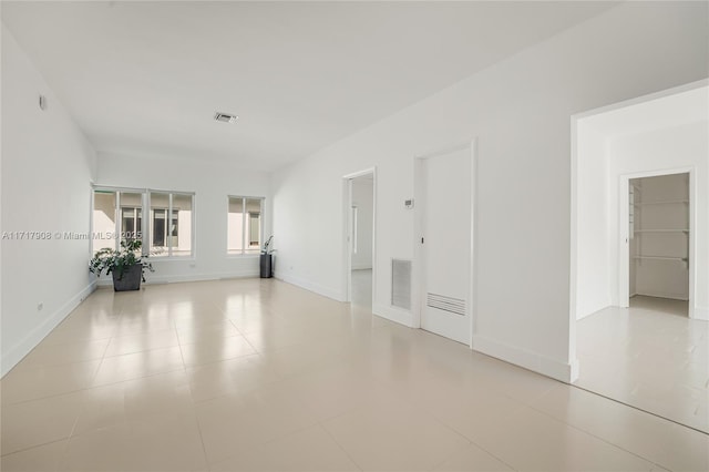 view of tiled spare room