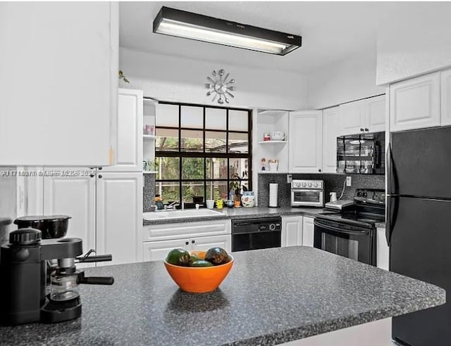 kitchen featuring black appliances, backsplash, white cabinets, and sink