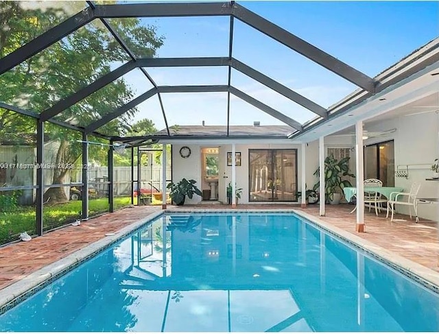 view of pool featuring a lanai and a patio area