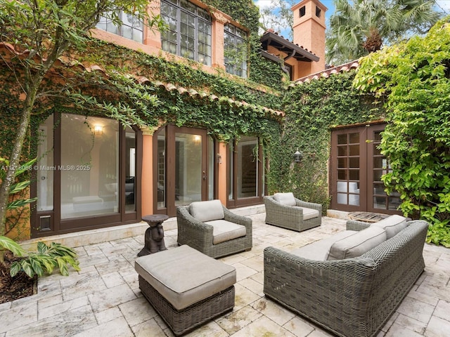 view of patio / terrace with outdoor lounge area and french doors