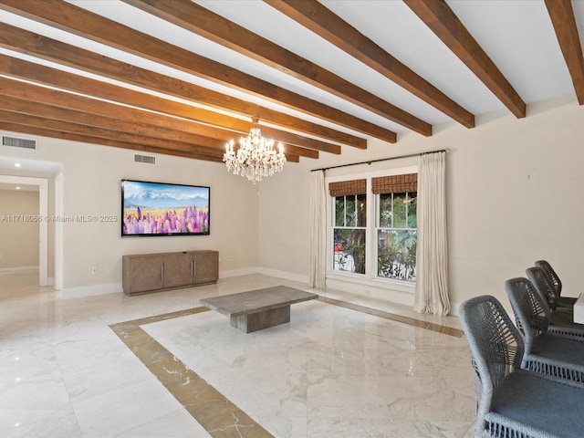 living room with beamed ceiling and a chandelier