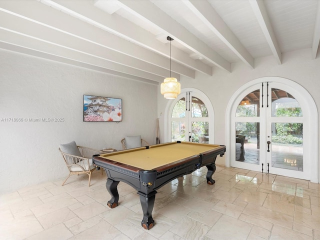 recreation room with beamed ceiling, pool table, and french doors