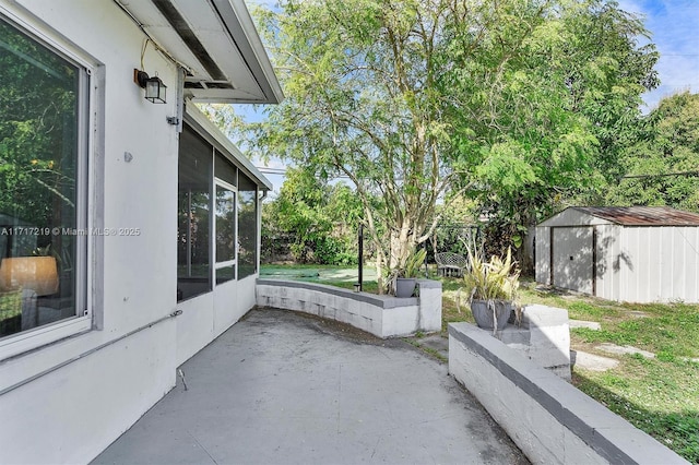 view of patio / terrace featuring a storage unit