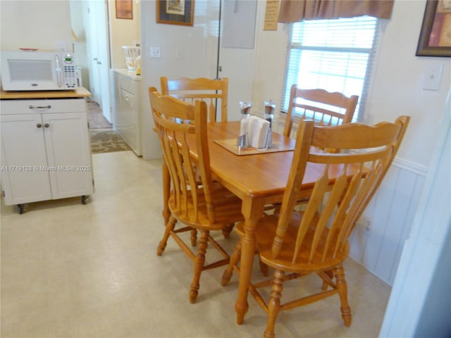 dining room featuring washing machine and dryer